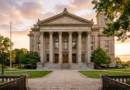 Courthouse exterior with columns at golden hour