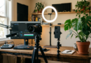 Content creator desk with camera, phone and plant